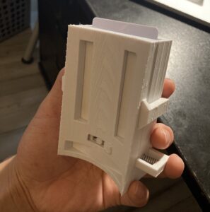 Wrist-mounted card launcher wallet